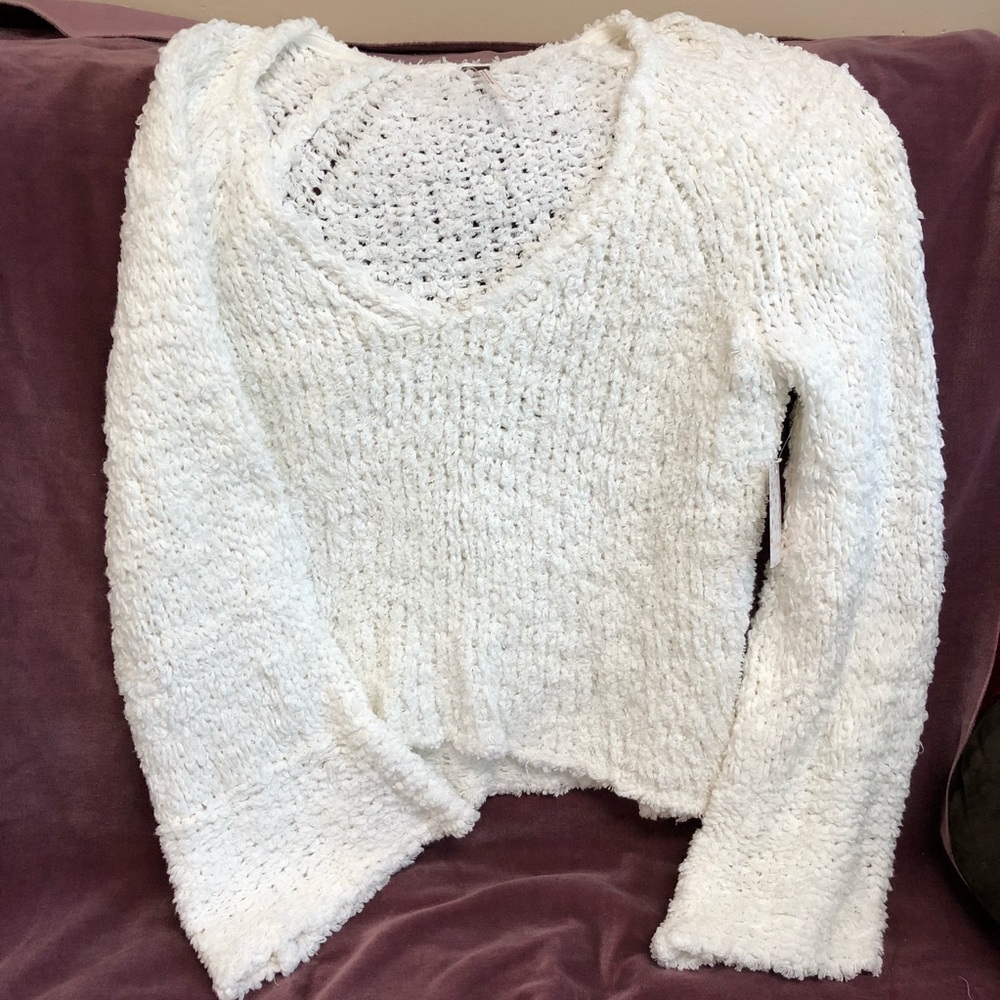 Chunky knit white sweater with bell sleeves